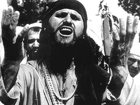 Боевик- дервиш в Чечне. Фото с сайта kavkazcenter.com (с) Боевик- дервиш в Чечне. Фото с сайта kavkazcenter.com (с)