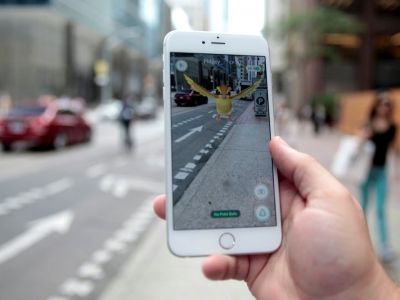 Ловля покемонов. Фото: REUTERS/Chris Helgren Ловля покемонов. Фото: REUTERS/Chris Helgren